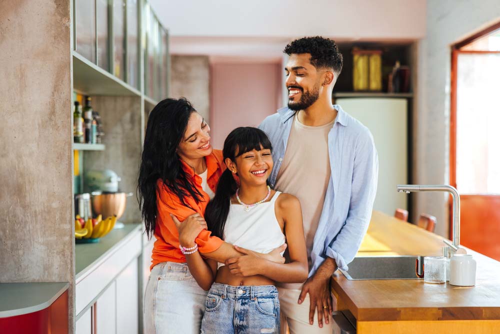 Happy family enjoying healthy smiles after visiting the dentist